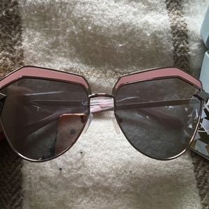 Rose gold Karen Walker sunglasses