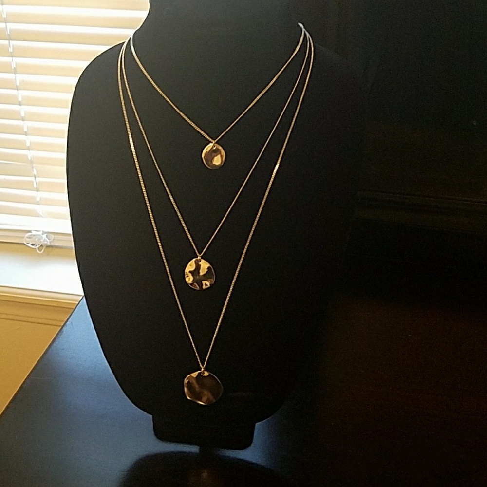 Three row paillete graduated pendant.