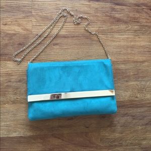 Teal clutch with strap