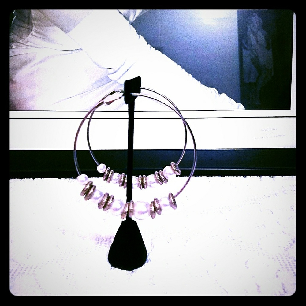 Pearl embellishments earrings