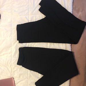 2 pairs of plain black leggings