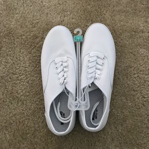 All white canvas shoes