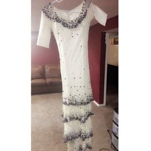 Quarter length white with black detailing gown