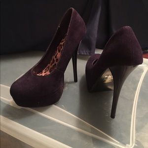 Dark purple pumps
