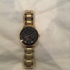 Women's gold fossil watch