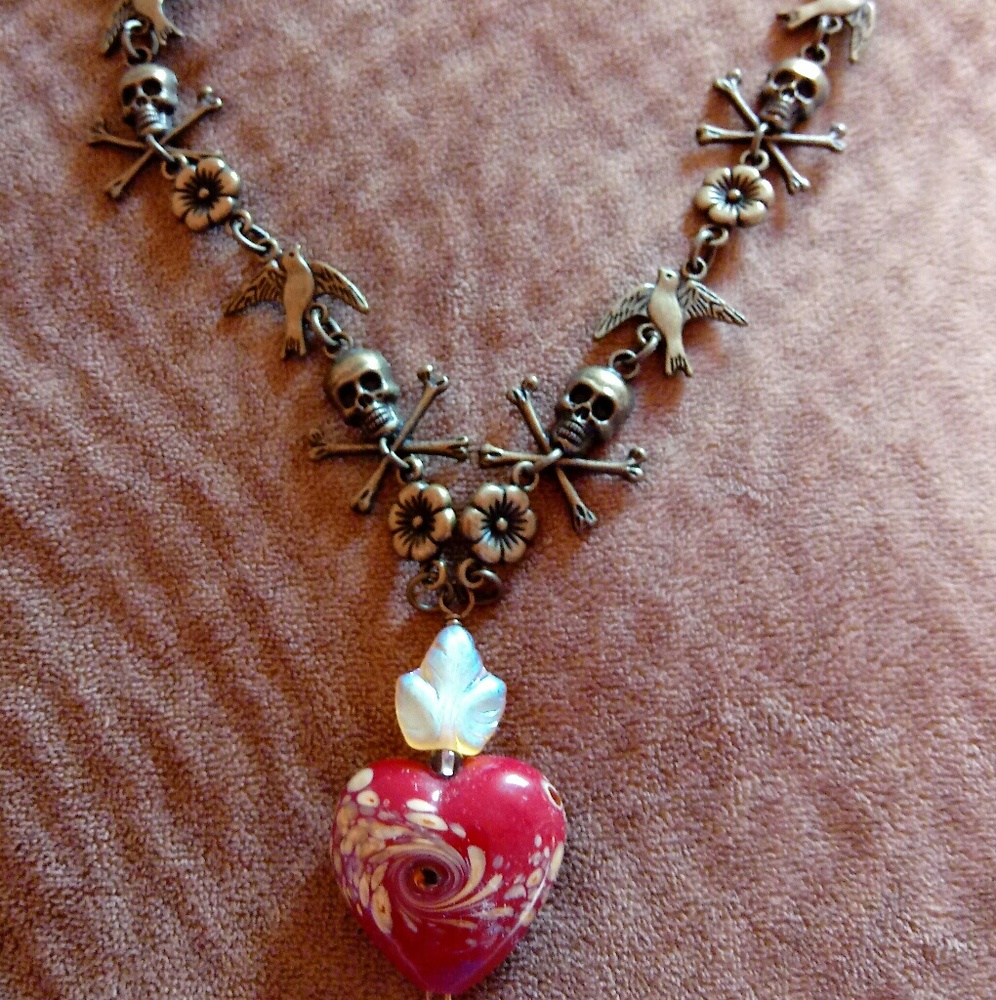 Skull and crossbones heart necklace