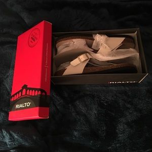 Selling these Carmela White Sandels, never worn