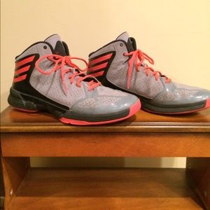 Men's Size 11 Adidas high top basketball shoes.