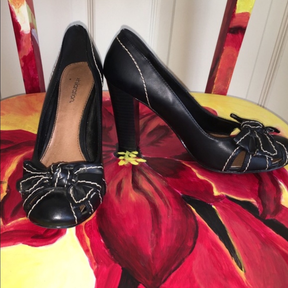 Black Faux leather, 3" heels. Super Cute!