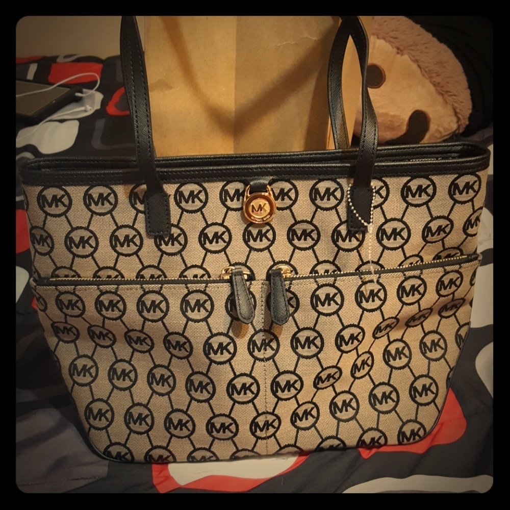 Michael Kors shoulder.