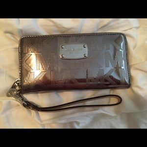 MK metallic wristlet