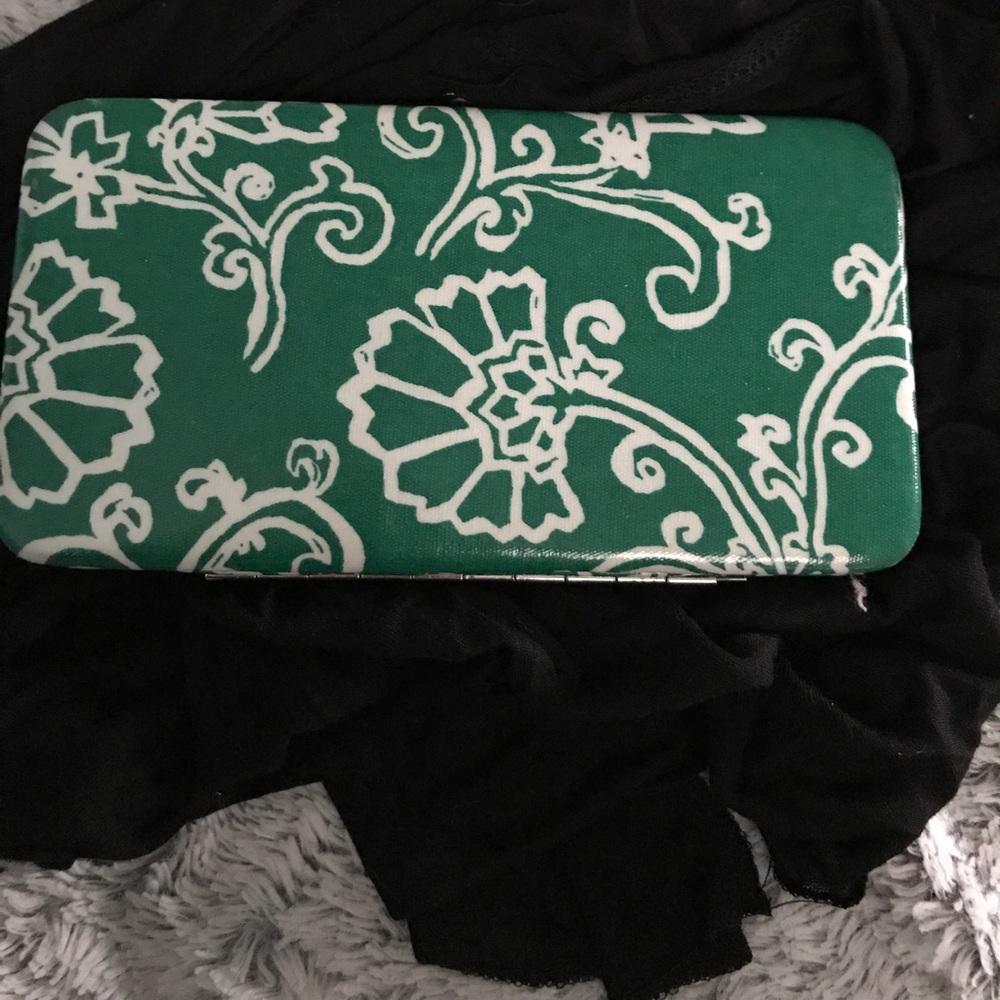 Green wallet with cute white floral design
