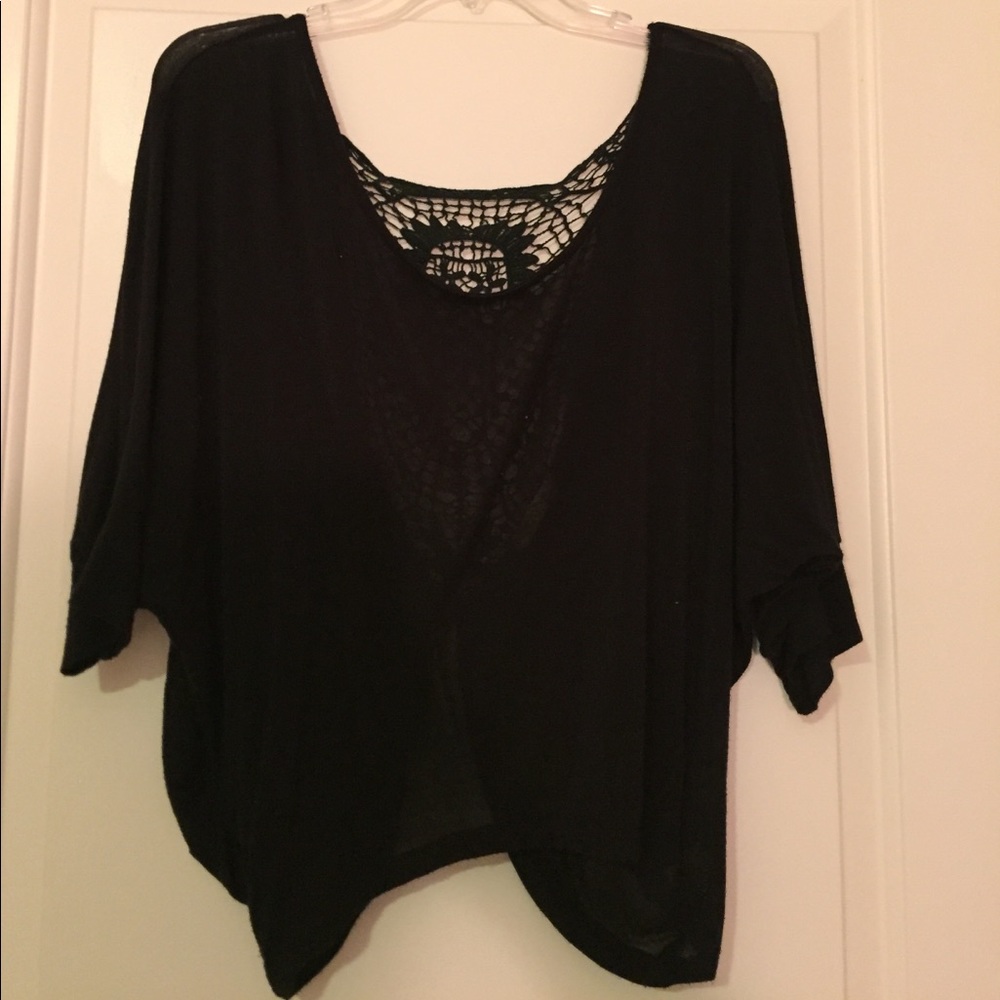 Fancy black shirt. Condition: Good