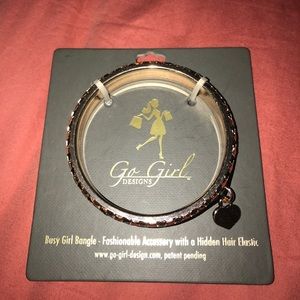 Fashionable bangle with hidden hair elastic