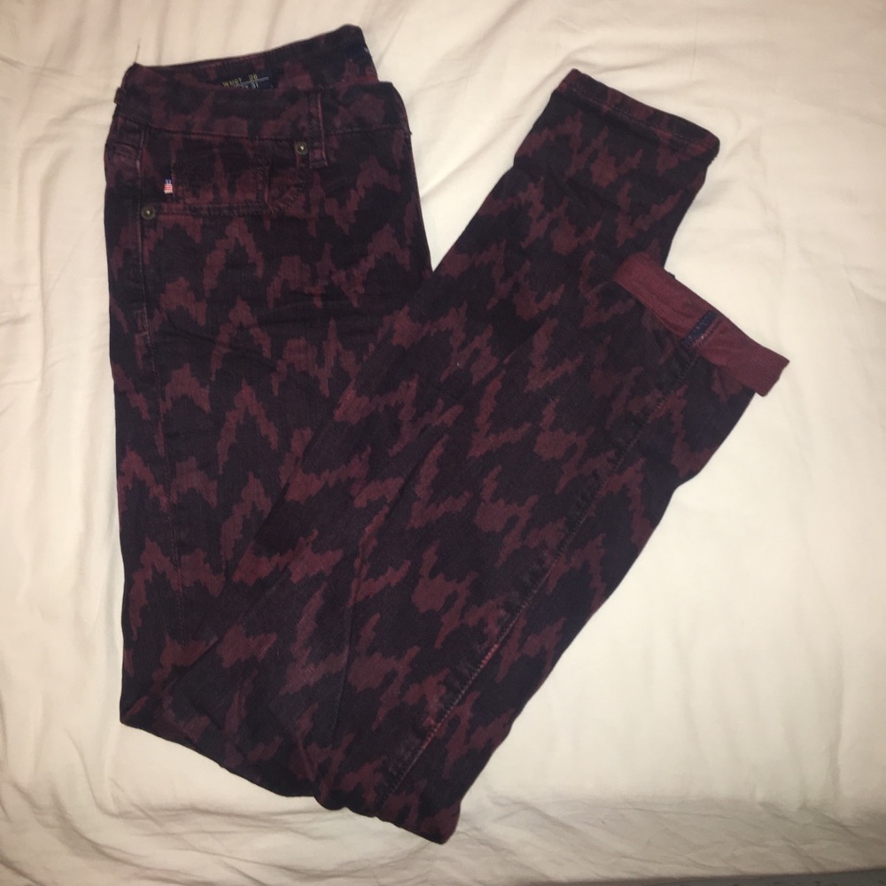 Dark red jeans with geometric pattern