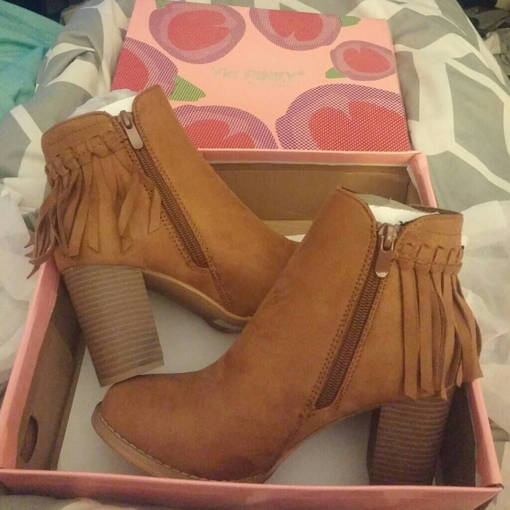 Brand new fringe boots