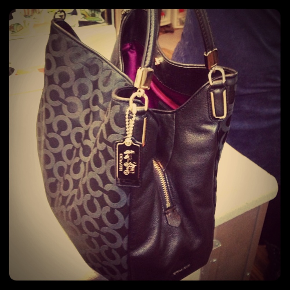 Coach black handbag with purple satin lining