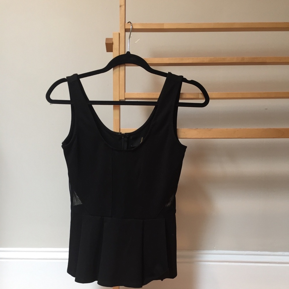 Black peplum top with mesh cut out