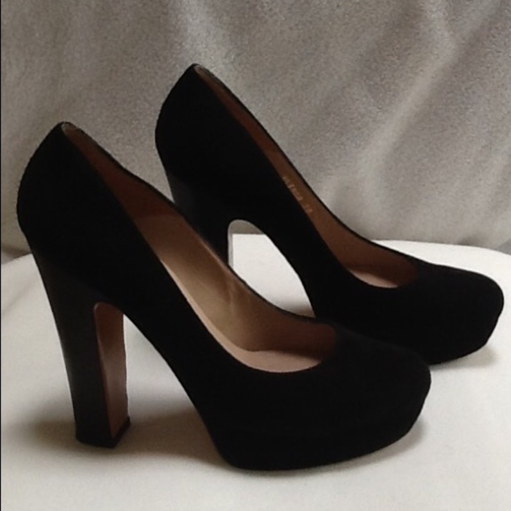 Pura Lopez, platform black suede hells.