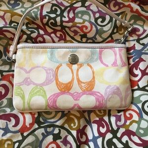 White multicolored Coach wristlet