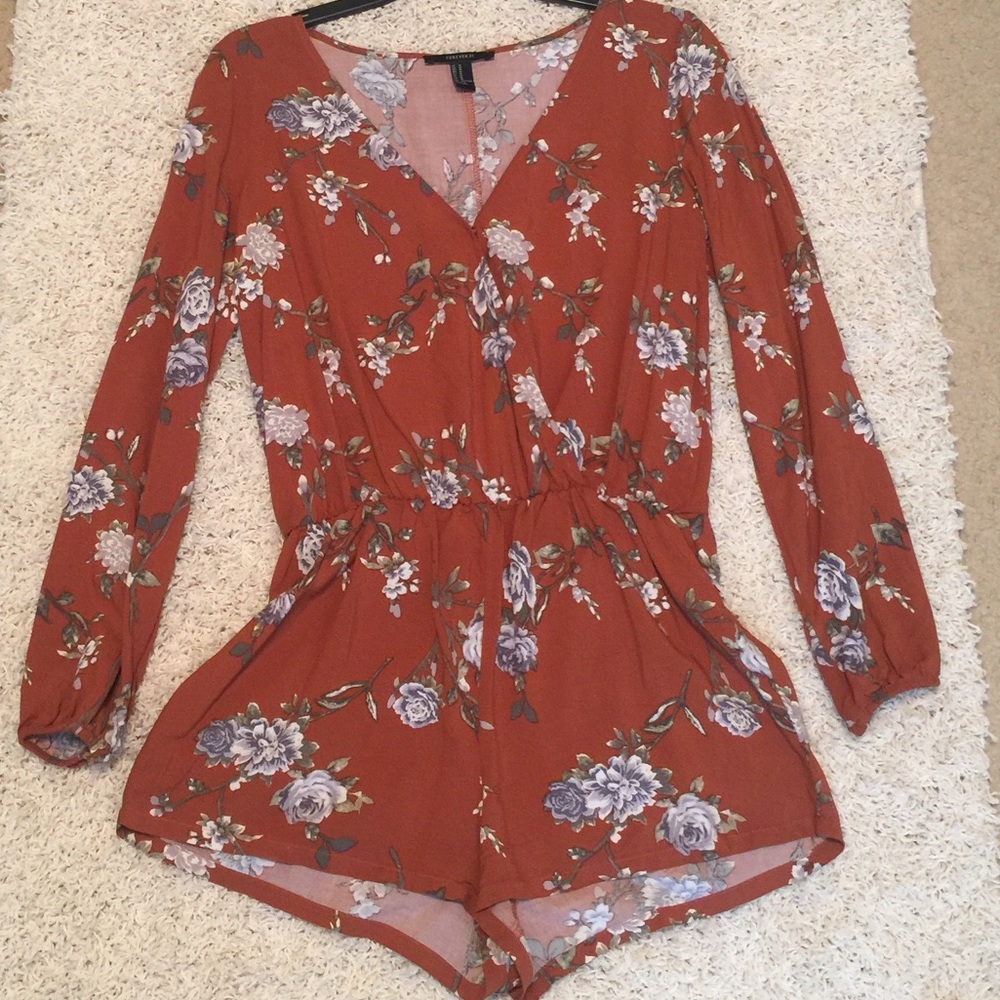 Floral long sleeve low V with snap closure romper