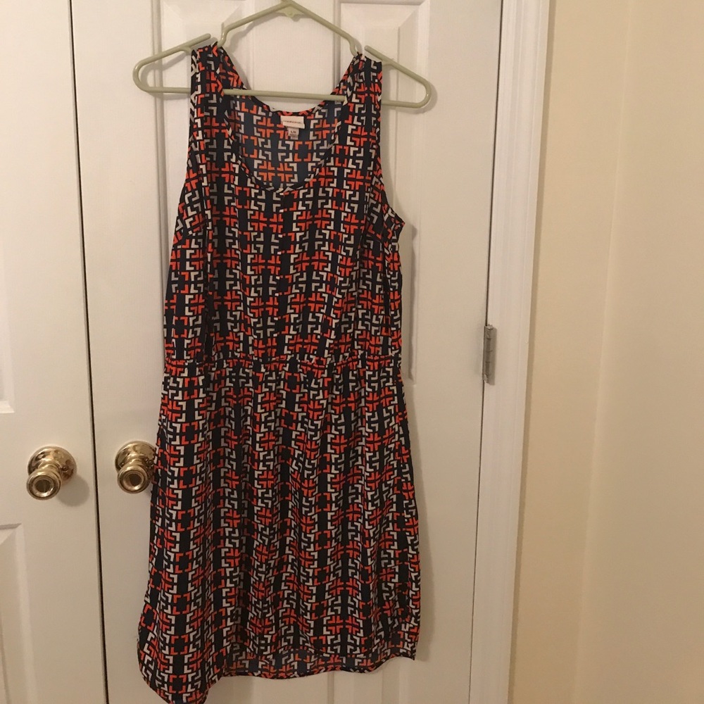 Navy, orange, and off white dress