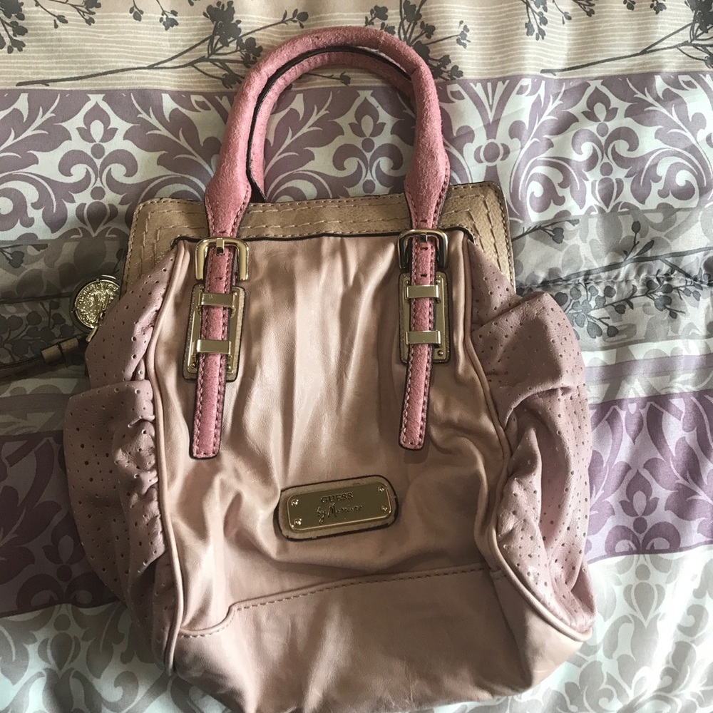 g by Guess handbag. Some signs of use. No damage
