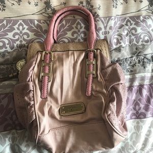 g by Guess handbag. Some signs of use. No damage