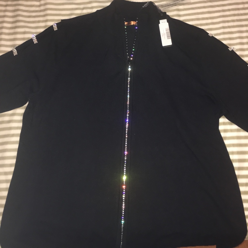 Black sweater with beautiful accents on zipper