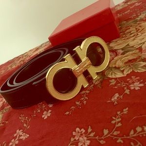 Black ferragamo belt with gold buckle