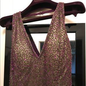 Purple and green beaded gown. Slit, train, halter.