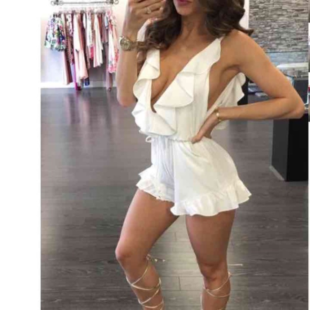 NWT ruffle romper the boutique Miami
