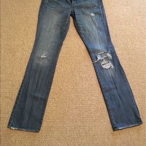 American Eagle light wash destroyed jeans