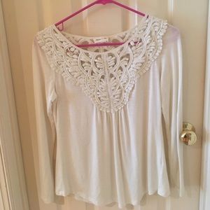 White shirt with beautiful detailing on the top