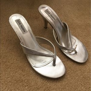 Steve Madden silver backless heel.