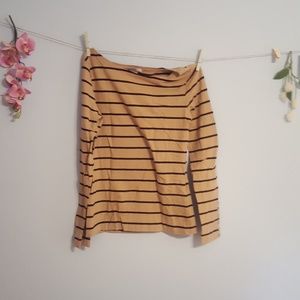 Button detail on sleeve and left shoulder.