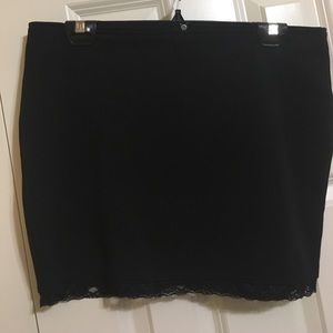Black mini skirt with lace detail at the bottom