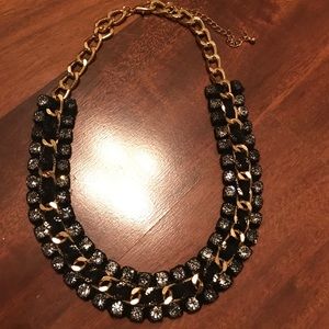 Gold necklace with black lace and stones