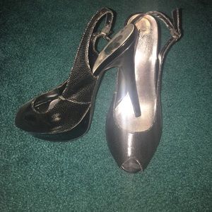 Peep toe snake skin heels