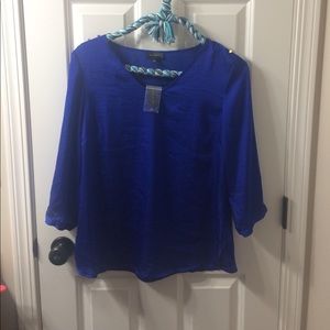 Bright blue summer top with gold buttons