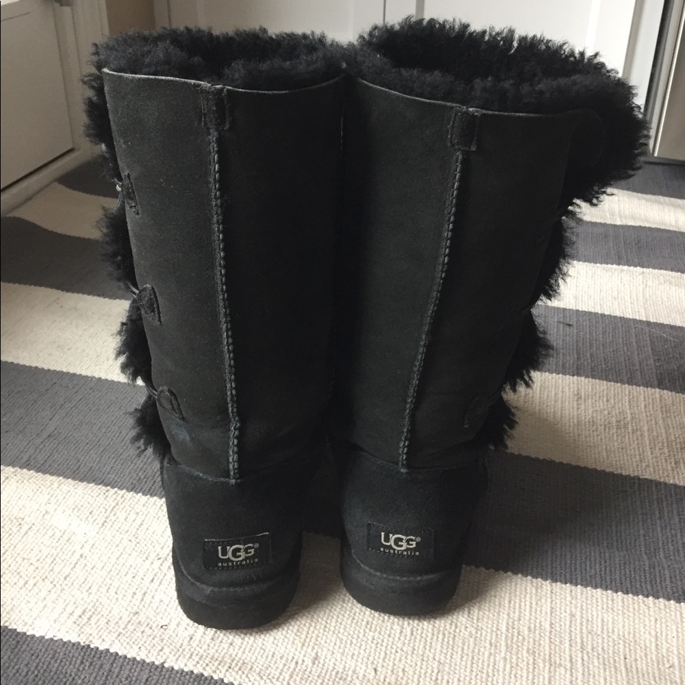 Tall black UGG boots