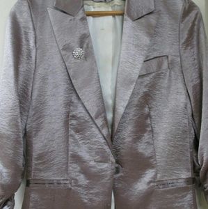 Fitted metallic lavender blazer with brouch