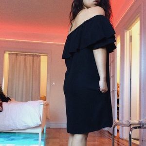 Black off shoulder ruffle dress