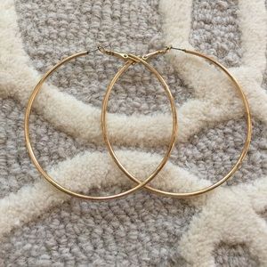 Gold hoop earrings.