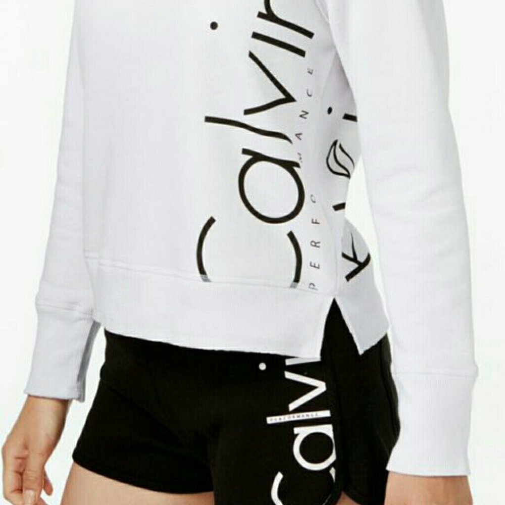 White Calvin KLEIN sweatshirt with silver writing