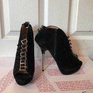 Black and gold heels