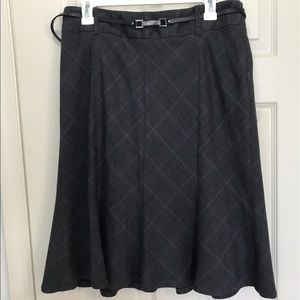 Gray and purple plaid fit and flair belted skirt.