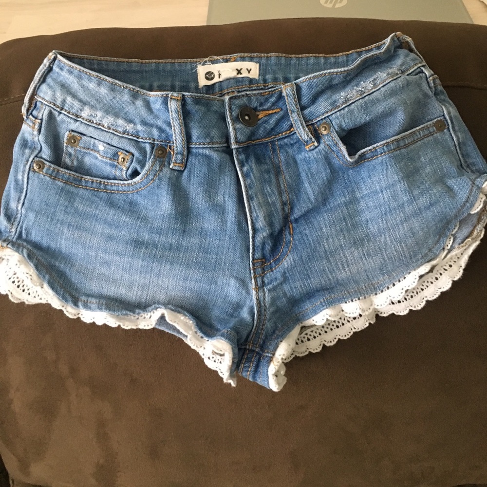 PacSun light wash denim shorts with eyelet fringe
