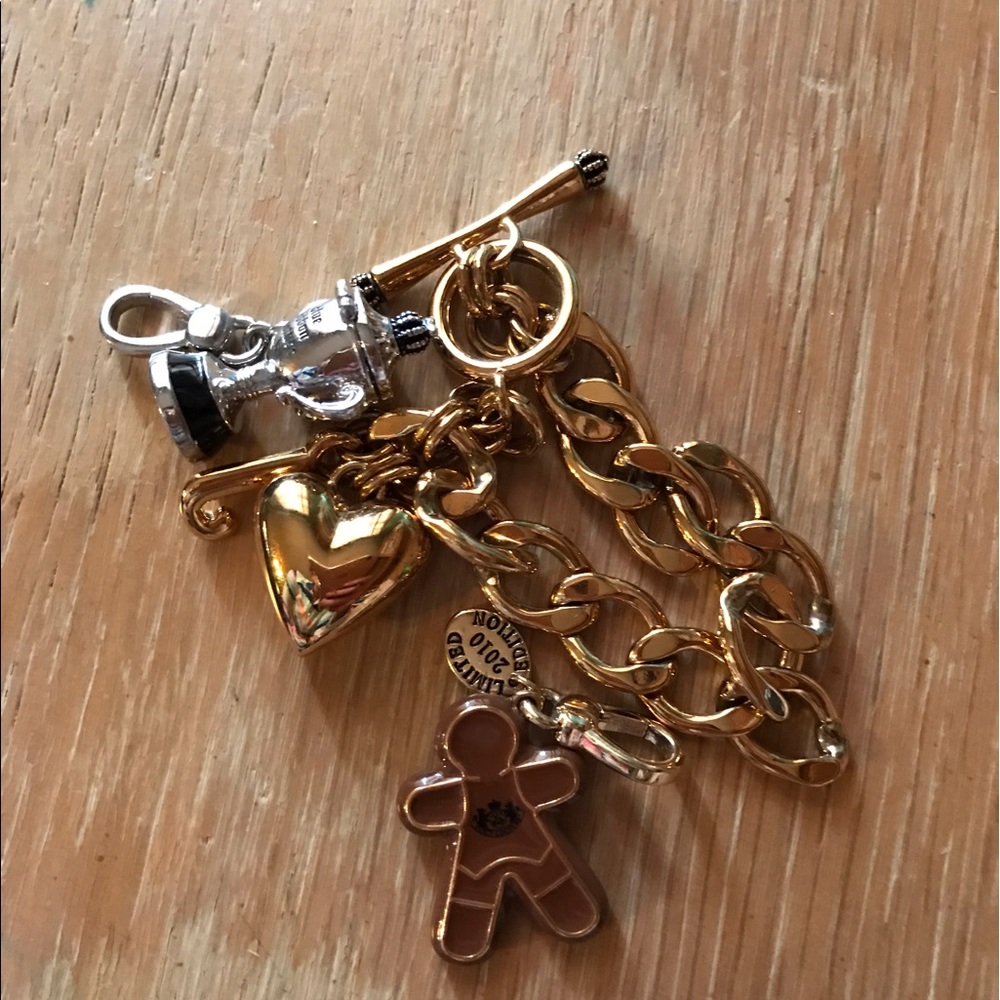 Juicy Couture charm bracelet with two extra charms