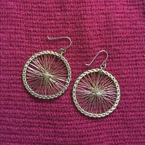 Gold colored metal round earrings